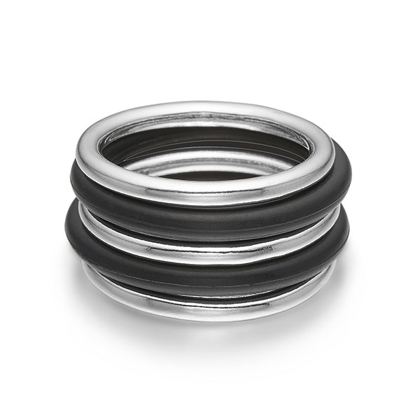 Rubber Soul stacking rings in sterling silver and rubber by Liisa Gude Deberitz.